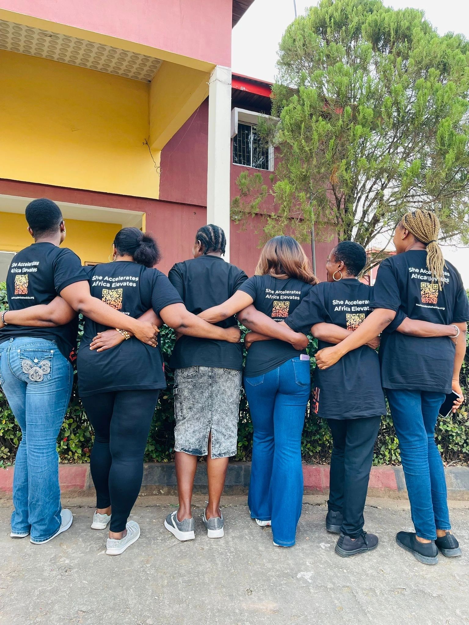 Dual Approach: Individual Empowerment + Corporate Partnerships